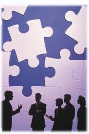 Group of people with puzzle pieces